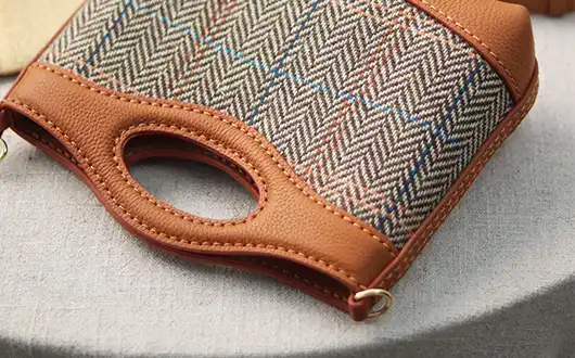 Exquisite stitching and craft details of patchwork bag