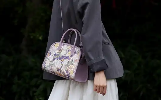 Crossbody Carry of the Lavender Floral Bag