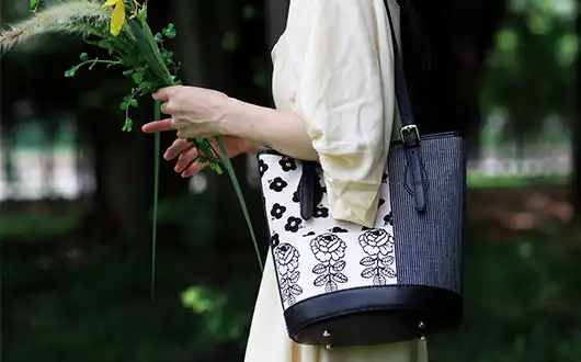 The patchwork shoulder bag styled in an outfit